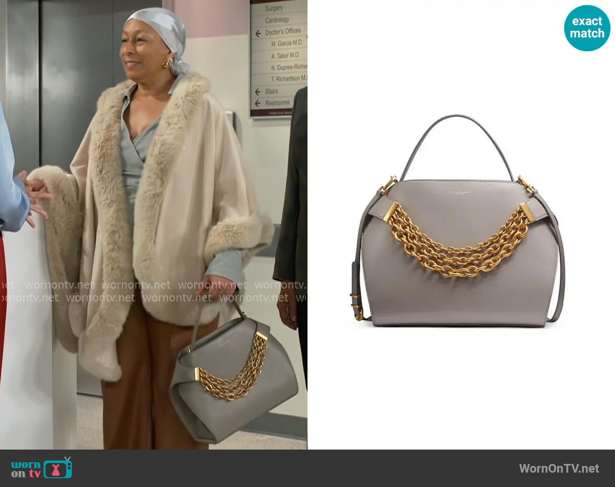 Alexis Bittar Solanales Two-Tone & Crystal Twisted Button Stud Earrings worn by Anita Dupree (Tamara Tunie) on Beyond the Gates