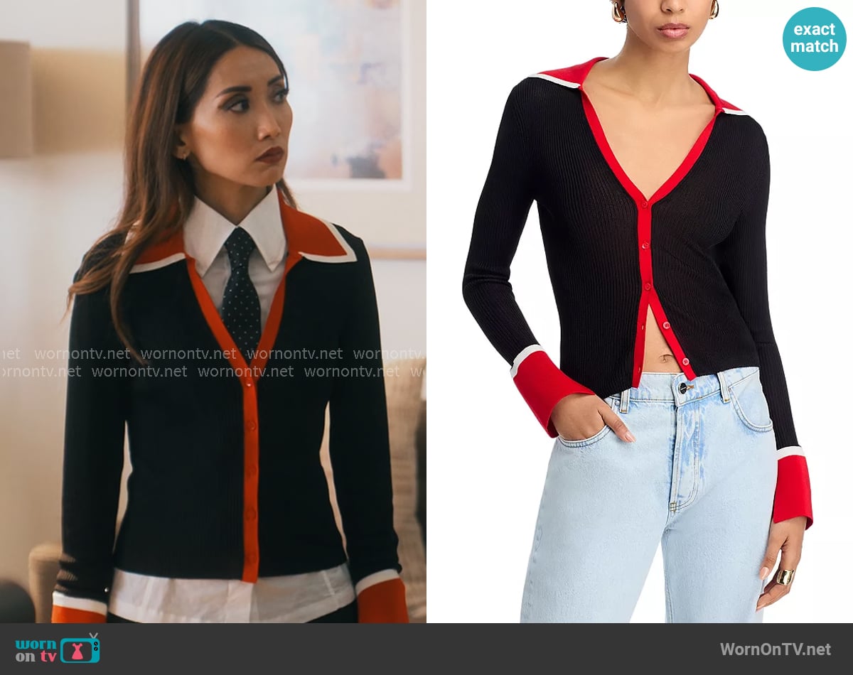 Ali’s cardigan with red trims on Running Point