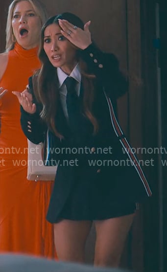 Ali's black side-stripe blazer on Running Point