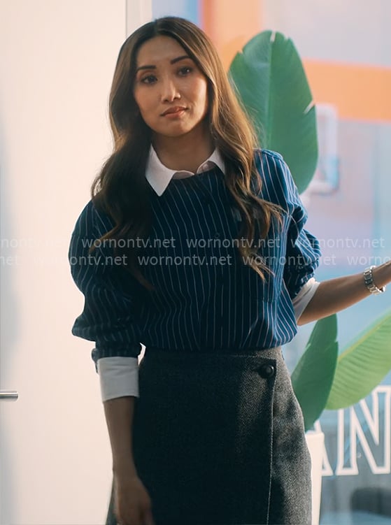 Ali's blue striped button down shirt and wrap skirt on Running Point