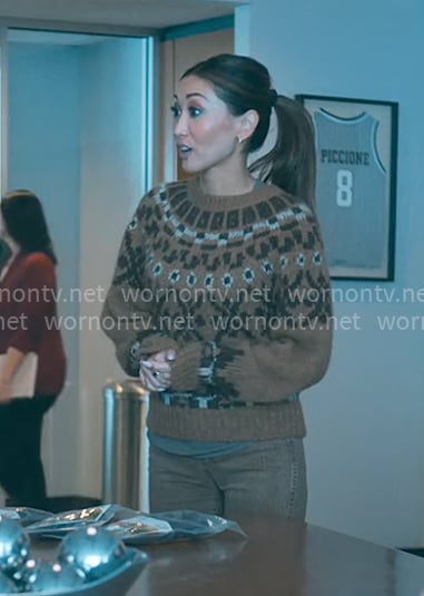 Ali's brown fair isle sweater on Running Point