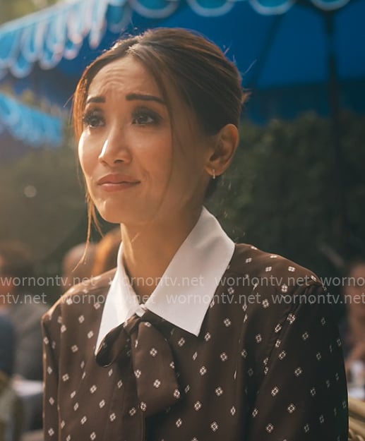 Ali's brown printed top with white collar on Running Point