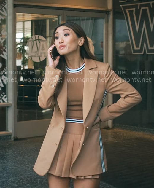 Ali’s camel side-stripe blazer and skirt set on Running Point
