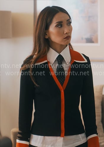 Ali's cardigan with red trims on Running Point