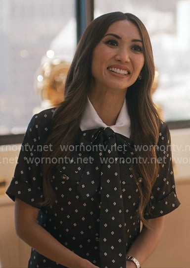 Ali's dark brown dotted print dress on Running Point