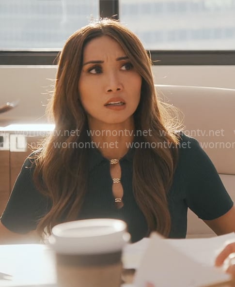 Ali's dark green polo top with gold S buttons on Running Point