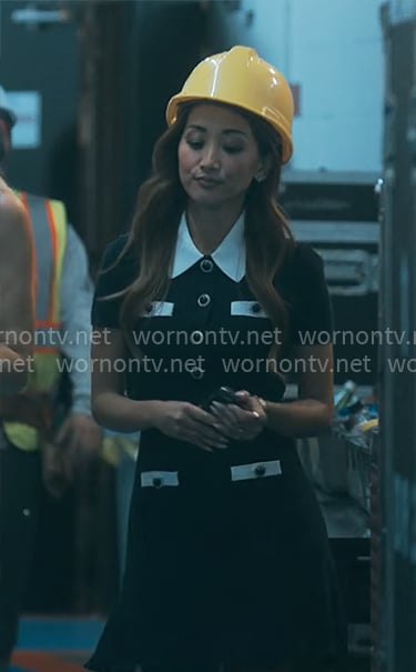 Ali’s navy dress with white collar and buttons on Running Point