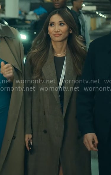 Ali's plaid coat on Running Point