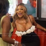 Angela’s black floral applique dress on The Real Housewives of Atlanta