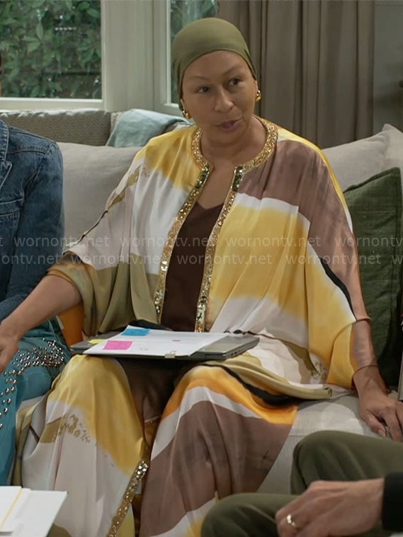 Anita’s yellow and brown printed robe and pants set on Beyond the Gates