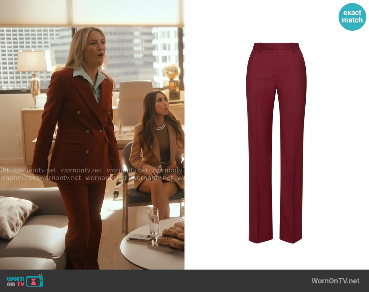 Isla’s dark red pants on Running Point