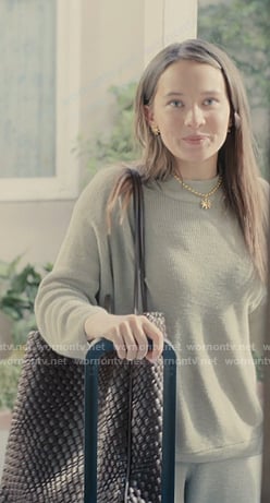 Ashley's brown woven tote bag on Beef