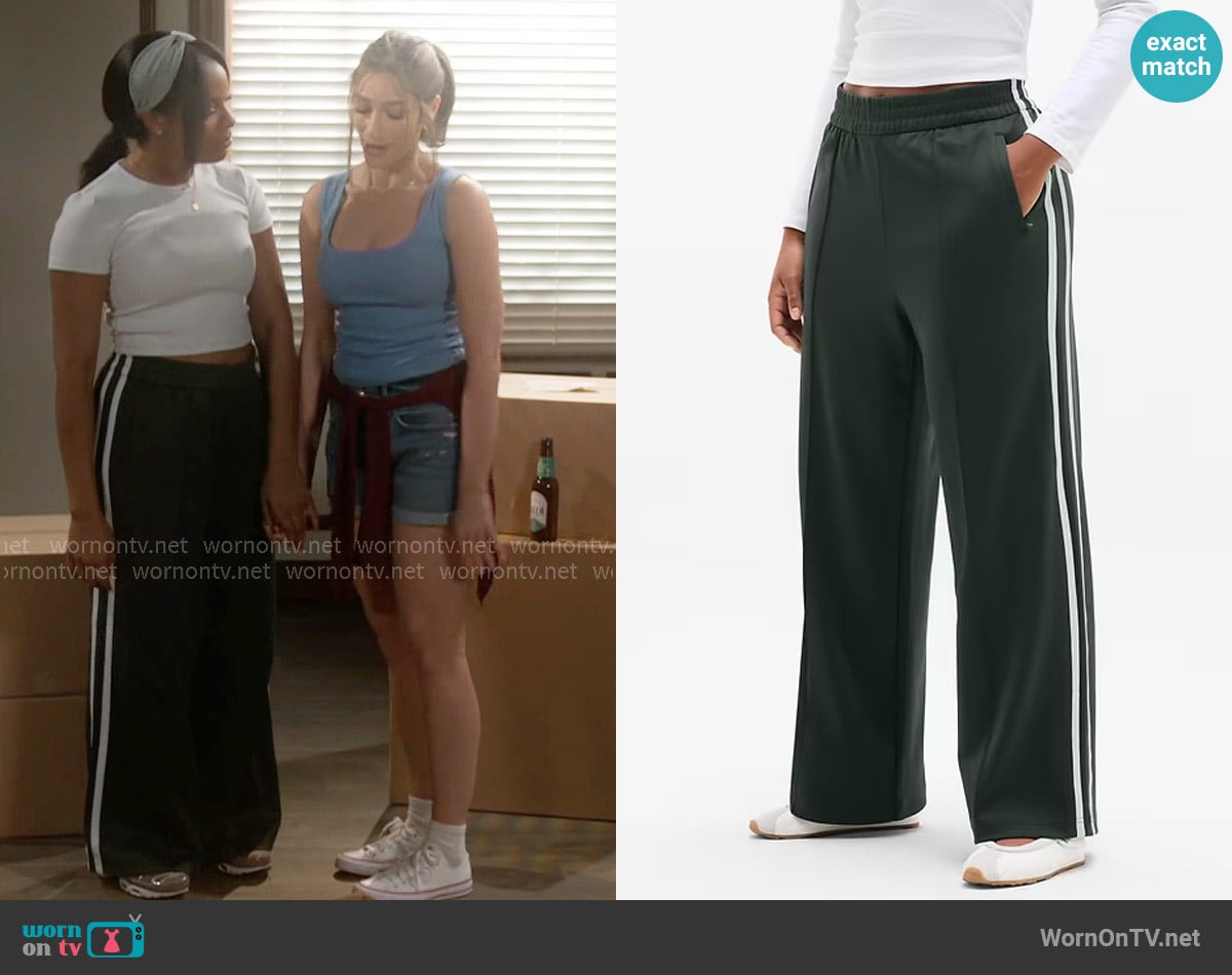 Naomi’s dark green track pants on Beyond the Gates Naomi’s dark green track pants on Beyond the Gates