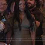 Ava’s khaki puff sleeve top and pleated pants on Abbott Elementary