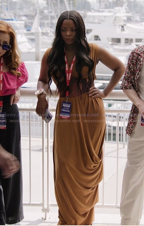 Ava's mustard drape dress on Abbott Elementary