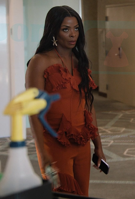 Ava’s orange ruffle top and pants on Abbott Elementary