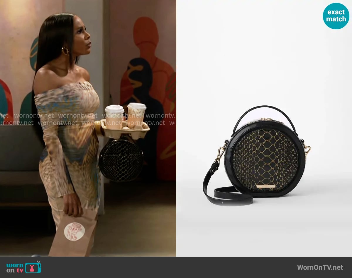 Brahmin Lane Bag in Black Cavatica worn by Hayley Lawson (Marquita Goings) on Beyond the Gates