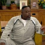 Calvin's velour track suit with stripe details on The Neighborhood