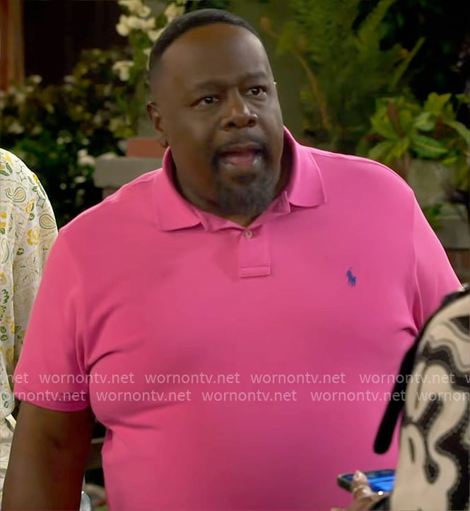 Calvin's fuchsia pink polo shirt on The Neighborhood