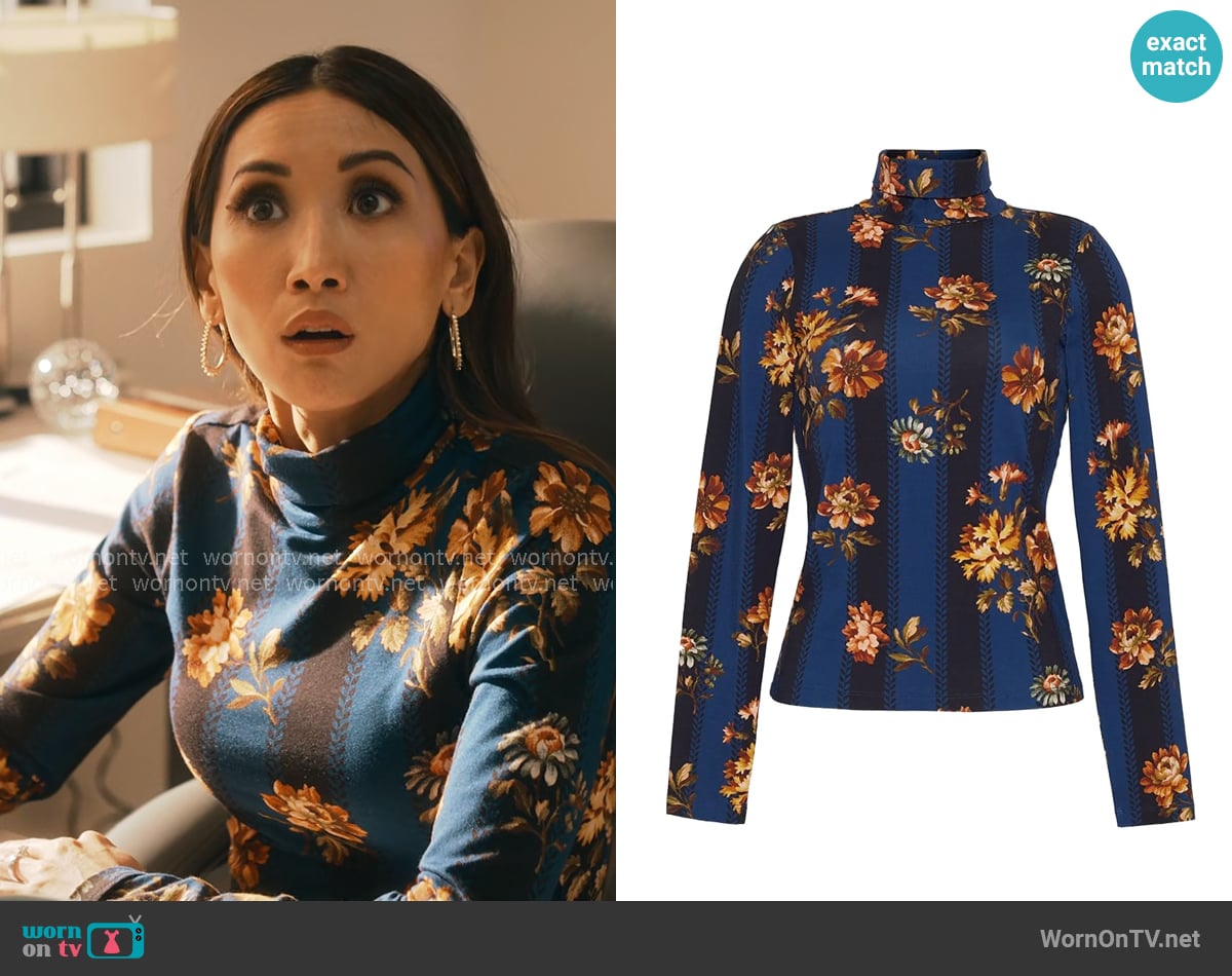 Ali’s blue floral top on Running Point