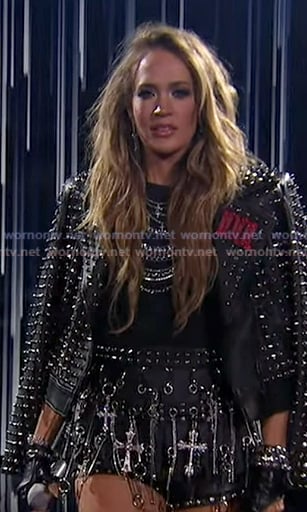 Carrie’s black studded leather moto jacket and shorts on American Idol