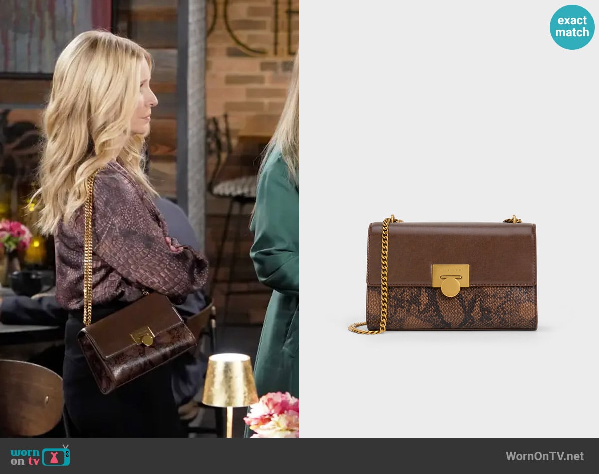 Charles & Keith Ebba Snake Bag worn by Christine Blair Williams (Lauralee Bell) on The Young and the Restless