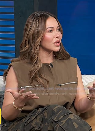 Chiquis Rivera’s brown zipped vest on Access Hollywood