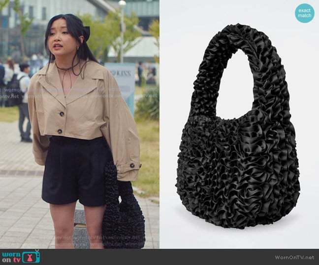 Cos Dahlia Shoulder Bag in Black worn by Lara Jean Covey (Lana Condor) on XO Kitty