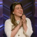 Kelly's beige knit sweater on The Kelly Clarkson Show
