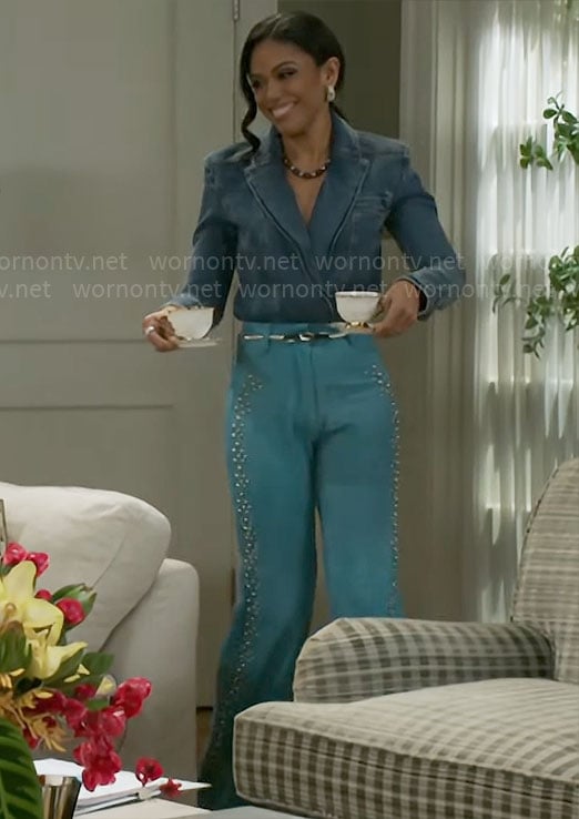 Dani’s denim top and blue studded pants on Beyond the Gates