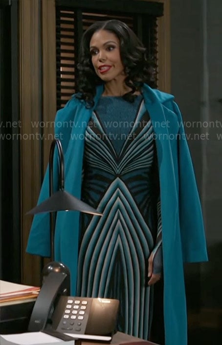 Dani’s turquoise blue geometric print mesh dress and coat on Beyond the Gates