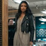 Daphne’s checked v-neck jumpsuit and leather jacket on High Potential