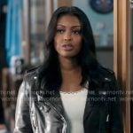 Daphne’s white scalloped top and brown leather jacket on High Potential