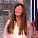 Jacqueline Taylor’s ivory pleated tie neck blouse on The View
