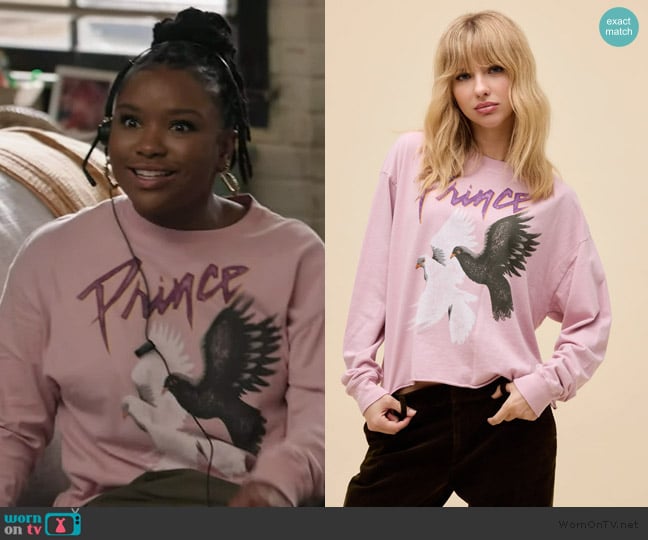 Erika’s pink prince graphic sweatshirt on Abbott Elementary