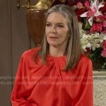 Diane’s red pleated blouse on The Young and the Restless