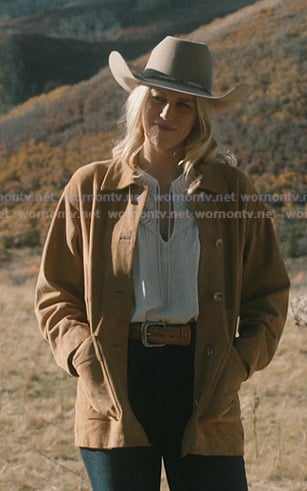 Dolly’s white tie neck blouse and suede jacket on Marshals