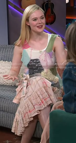 Elle Fanning’s patchwork knit vest and printed skirt on The Kelly Clarkson Show