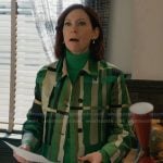 Elsbeth’s green abstract print coat on Elsbeth