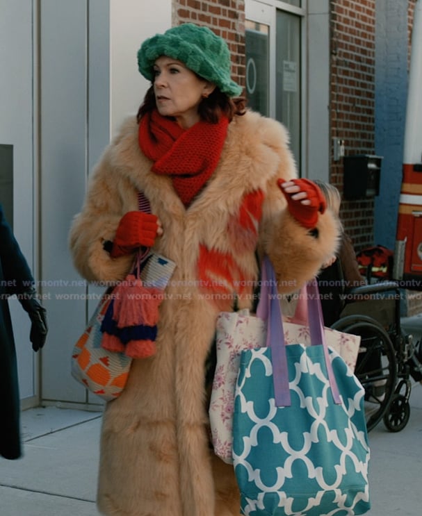 Elsbeth's orange fur coat on Elsbeth