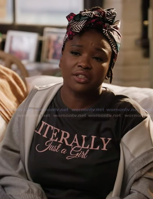 Erika's plaid pants and just a girl tee on Abbott Elementary