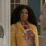 Eva’s yellow fringed jacket and heart print skirt on Beyond the Gates