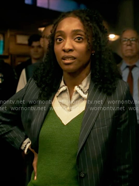 Faith’s blue shirt and green sweater vest on Will Trent