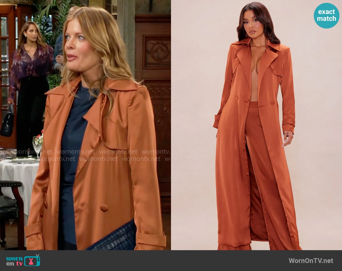 Fashion Nova Gabriella Satin Trench Coat And Pant Set in Rust worn by Phyllis Summers (Michelle Stafford) on The Young and the Restless