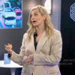 Gemma’s black and white dotted shirt and beige pinstripe blazer on The Neighborhood