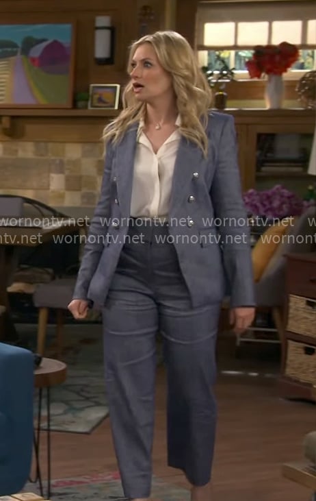 Gemma’s blue suit with silver buttons on The Neighborhood