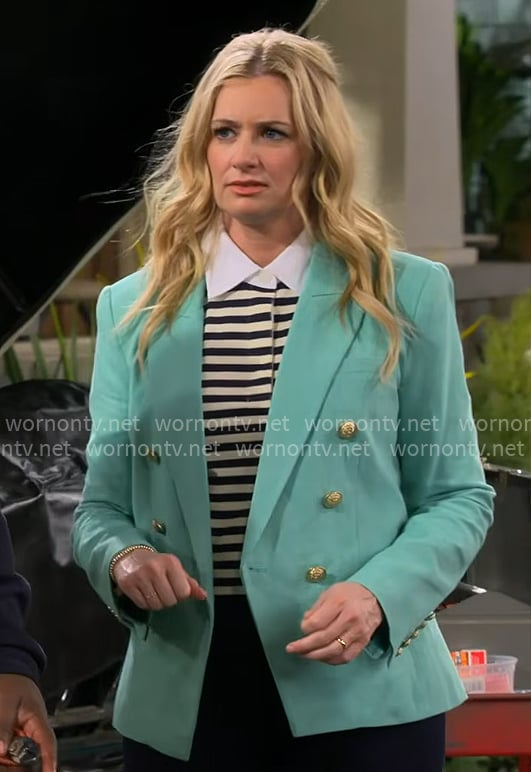 Gemma’s striped top and aqua green blazer on The Neighborhood