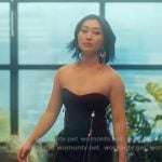 Gigi's black zip detail strapless top on XO Kitty