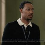 Gregory’s black contrast collar sweater on Abbott Elementary