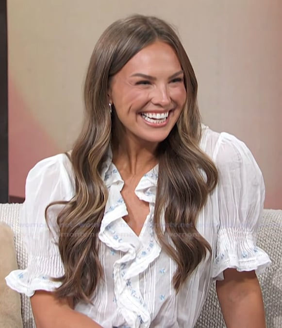Hanna Brown’s white embroidered ruffle top on Access Hollywood